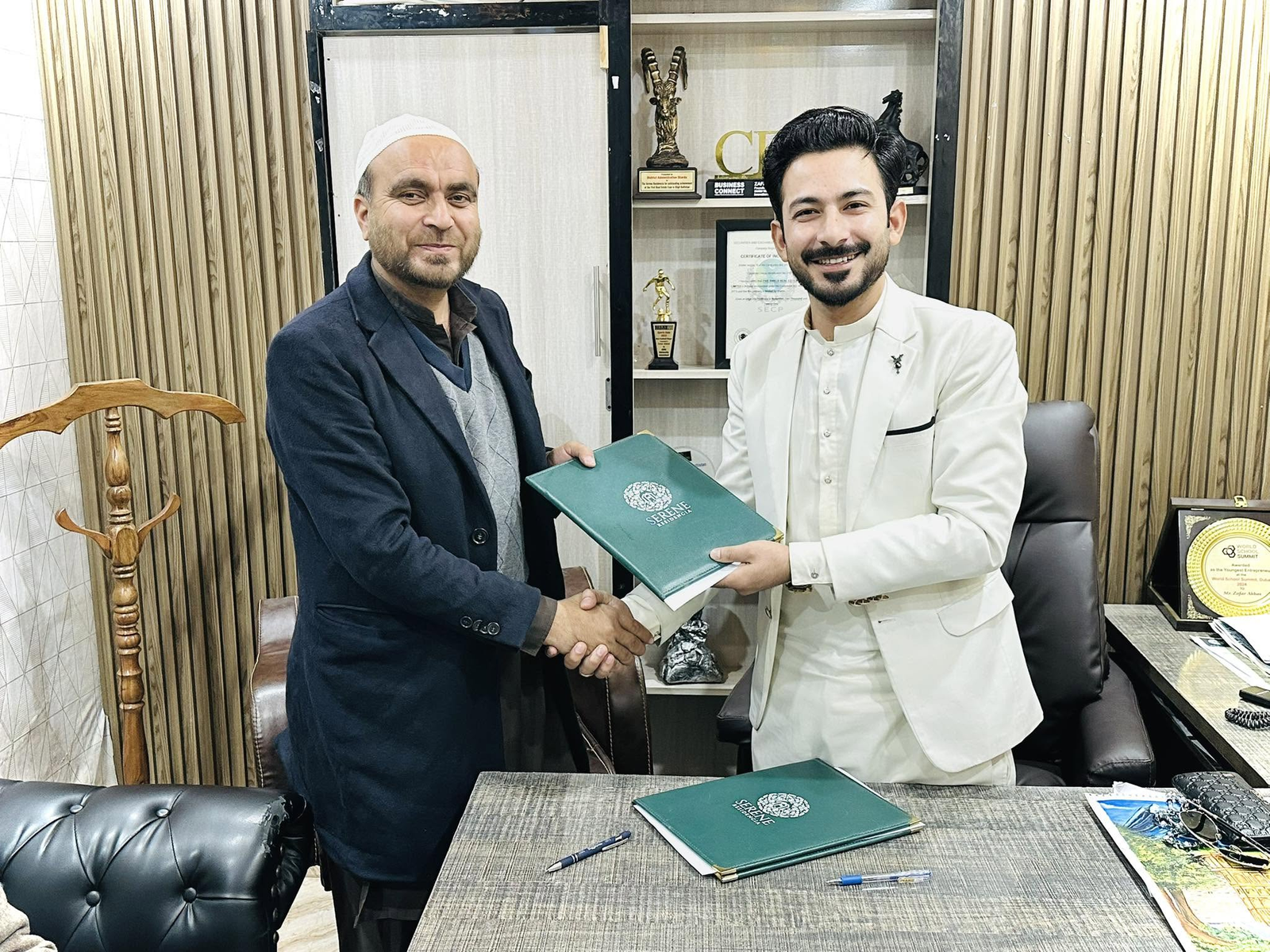 Zafar Abbas Karbalai meeting with a business partner